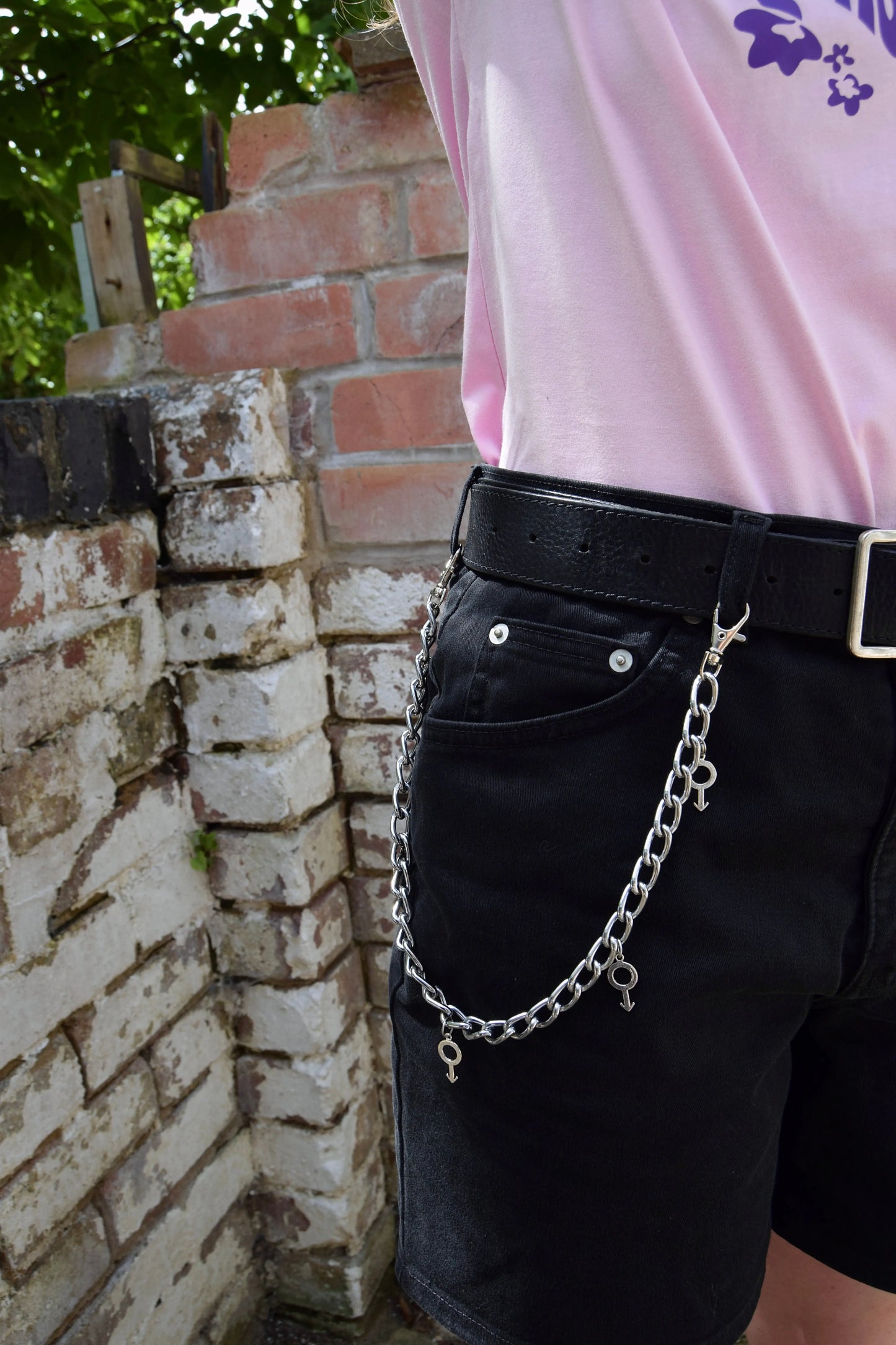 Jean chain with multiple mars symbol charms Leftbians