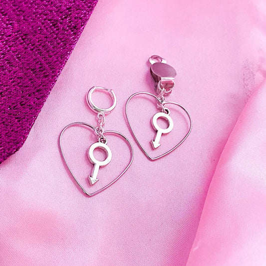 Silver colour heart and mars charm earrings Leftbians