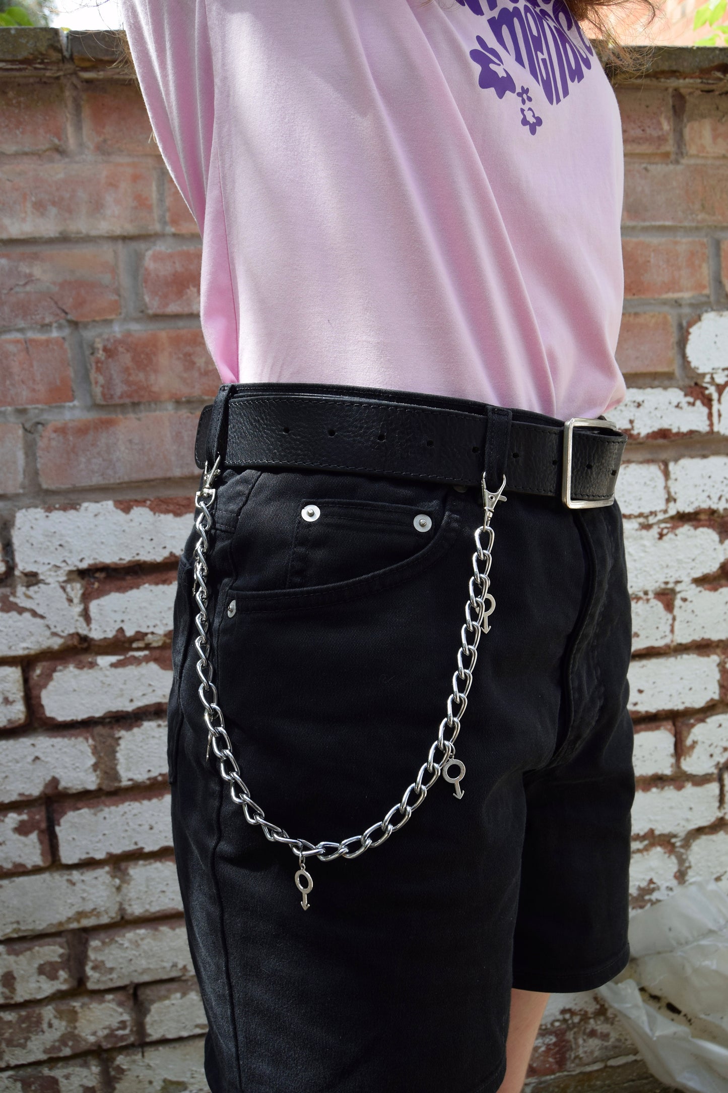 Jean chain with multiple mars symbol charms