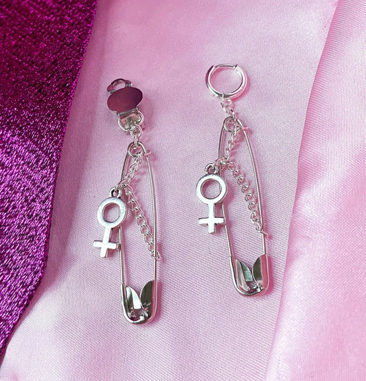 Safety pin earrings with Venus symbol charm Leftbians