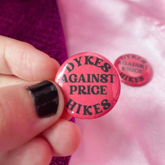 Dykes against price hikes badge Leftbians