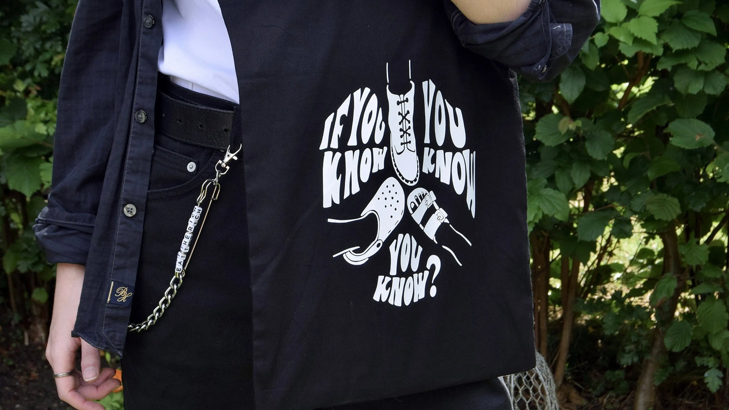 Crocs Stocks and Docs (If You Know, You Know) tote bag in black Leftbians