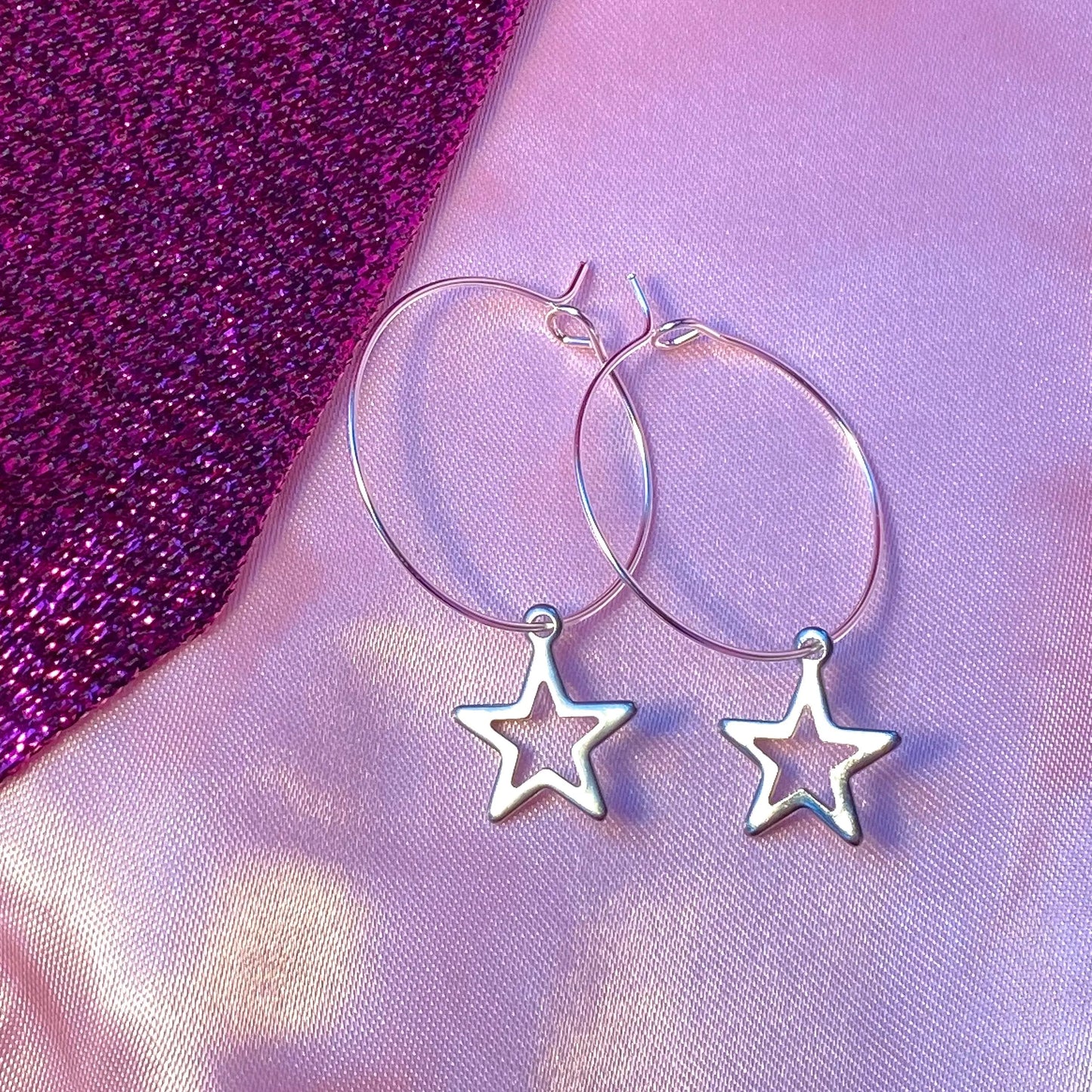 Silver star charm hoop earrings, minimalist celestial earrings Leftbians