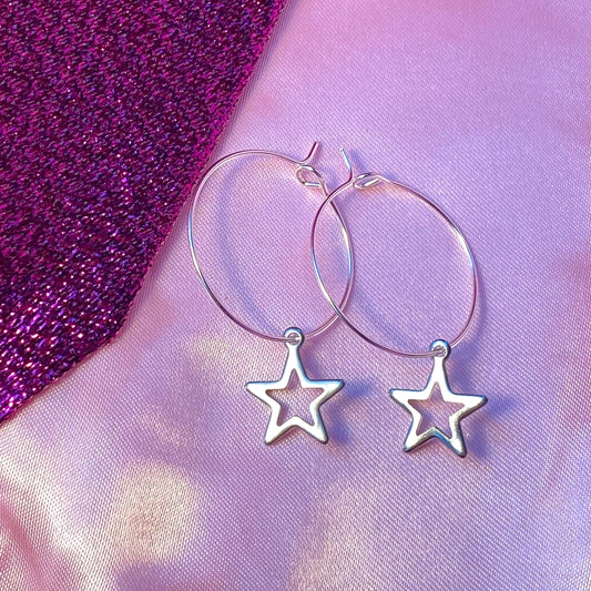Silver star charm hoop earrings, minimalist celestial earrings Leftbians