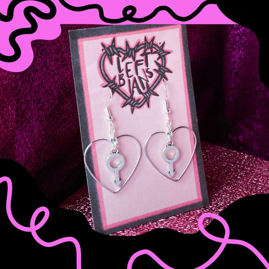 Silver colour heart and Mars charm earrings Leftbians