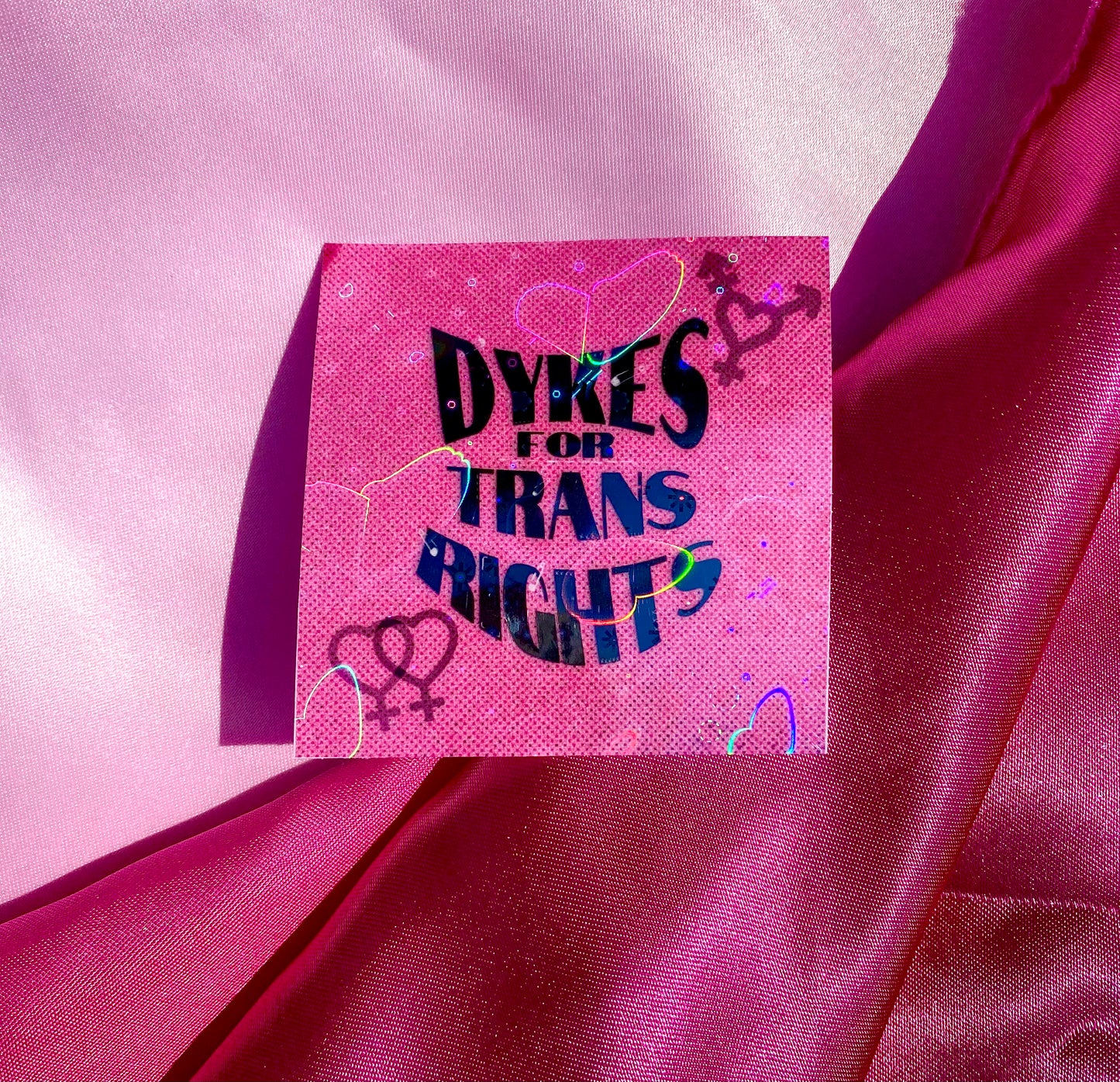 Dykes for trans rights sticker in pink Leftbians