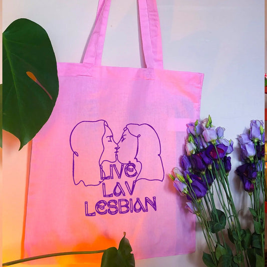 Live Lav Lesbian, pink tote bag with purple vinyl text and image. Leftbians Collab with Lavender Rodriguez Leftbians