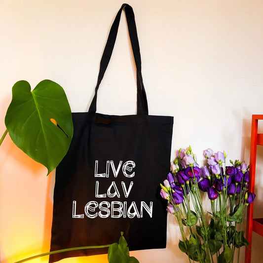 Live Lav Lesbian, black tote bag with white vinyl text. Leftbians Collab with Lavender Rodriguez Leftbians