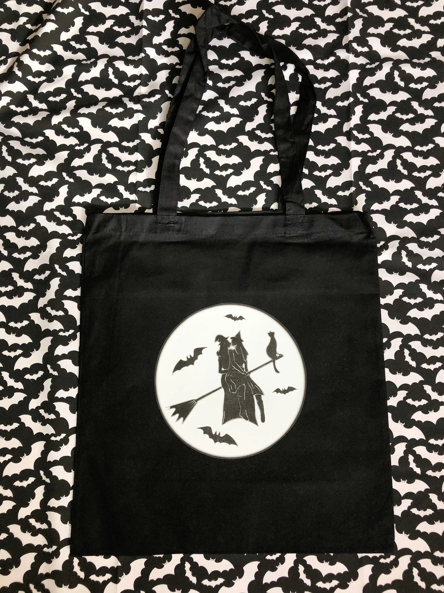 Gay witches on a broomstick, black tote bag Leftbians
