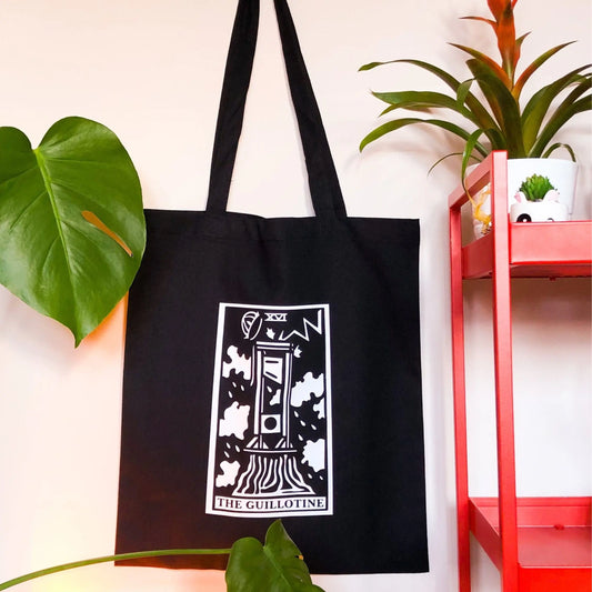 'The Guillotine' tarot card Tote bag in Black Leftbians