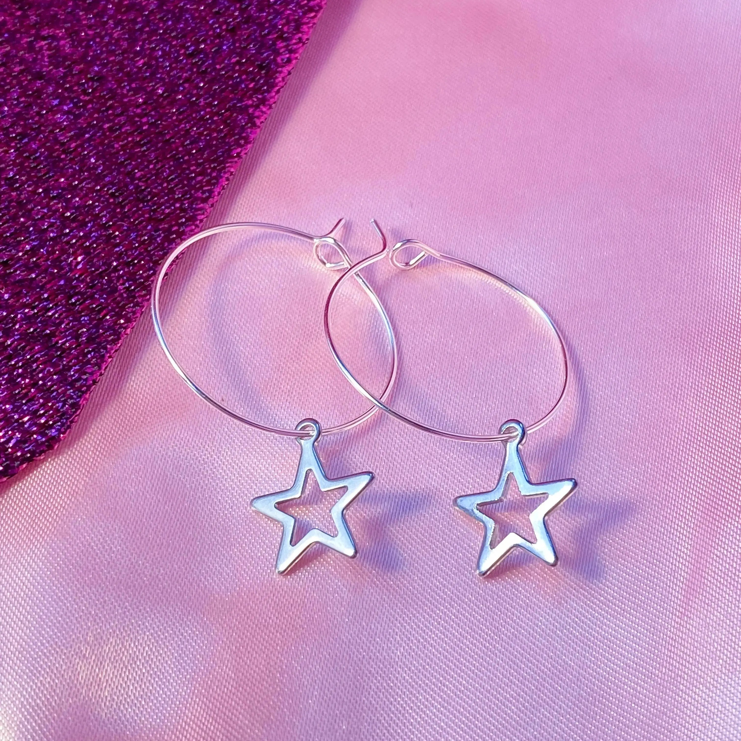 Silver star charm hoop earrings, minimalist celestial earrings Leftbians