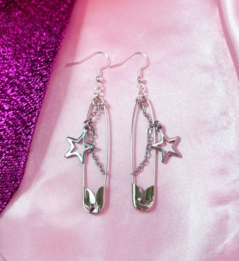 Safety pin with star charm earrings Leftbians