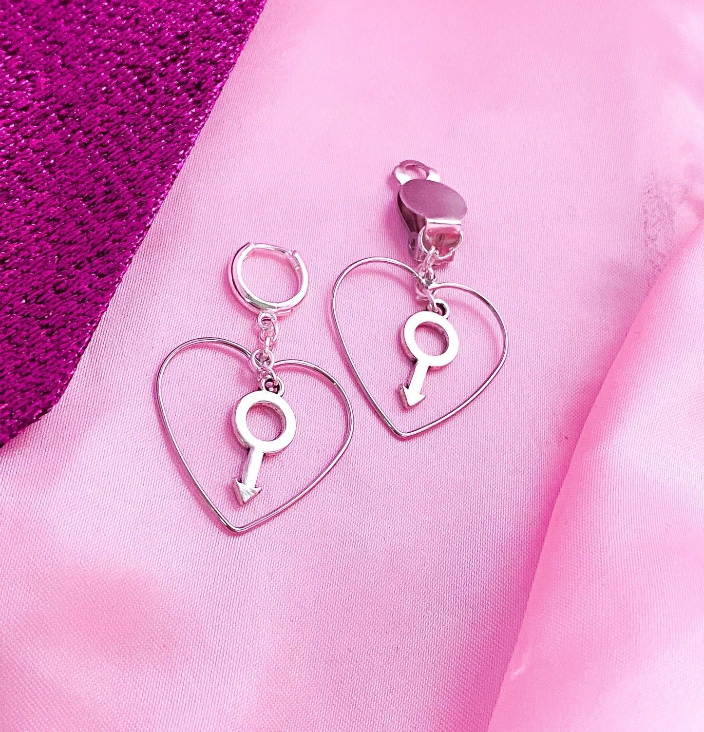 Silver colour heart and mars charm earrings