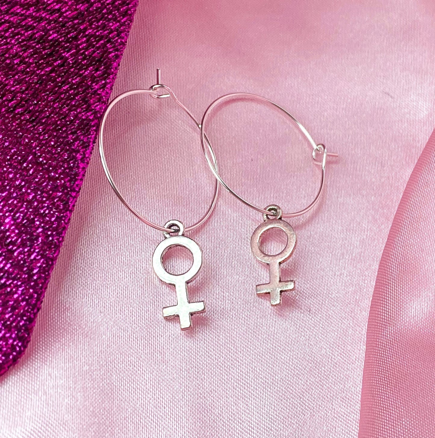 Silver Venus symbol hoop earrings