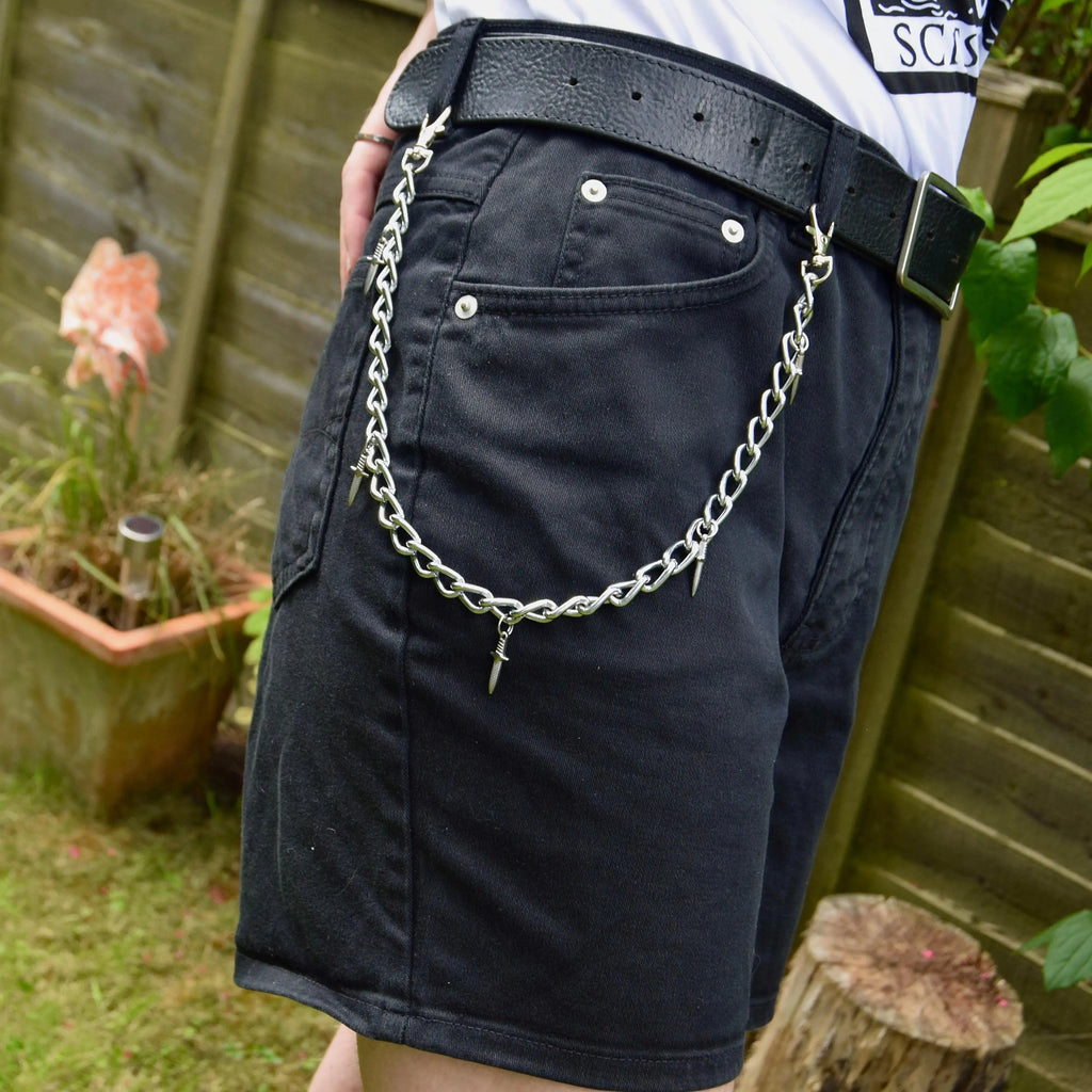 Jean chain with multiple dagger sword charms Leftbians