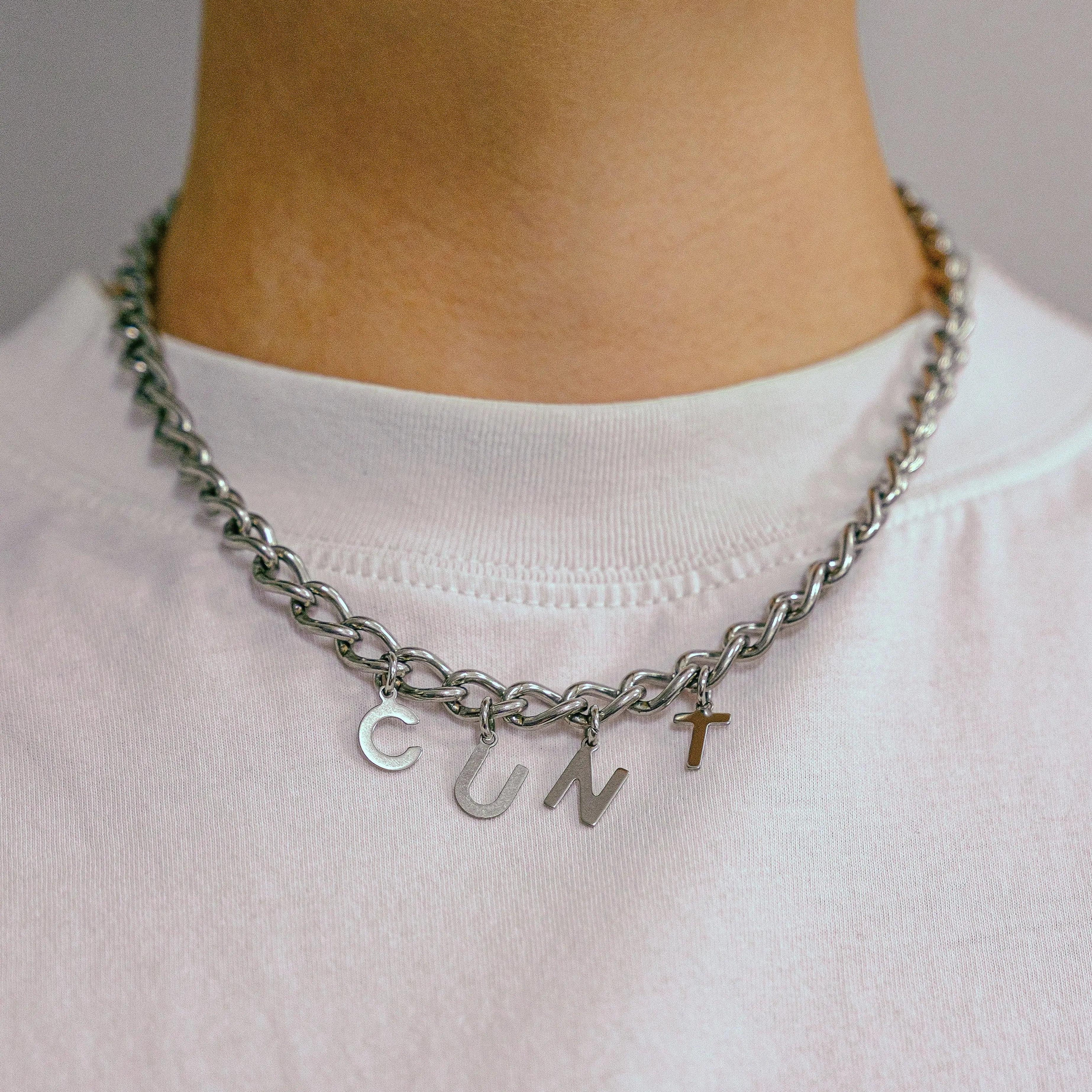 CUNT letter charm chain in stainless steel Leftbians