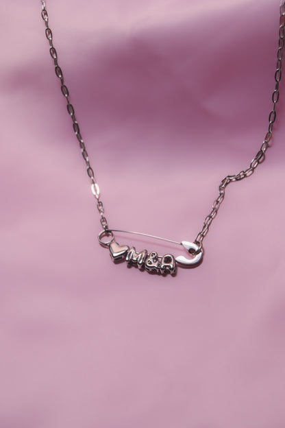 Silver safety pin couple heart necklace