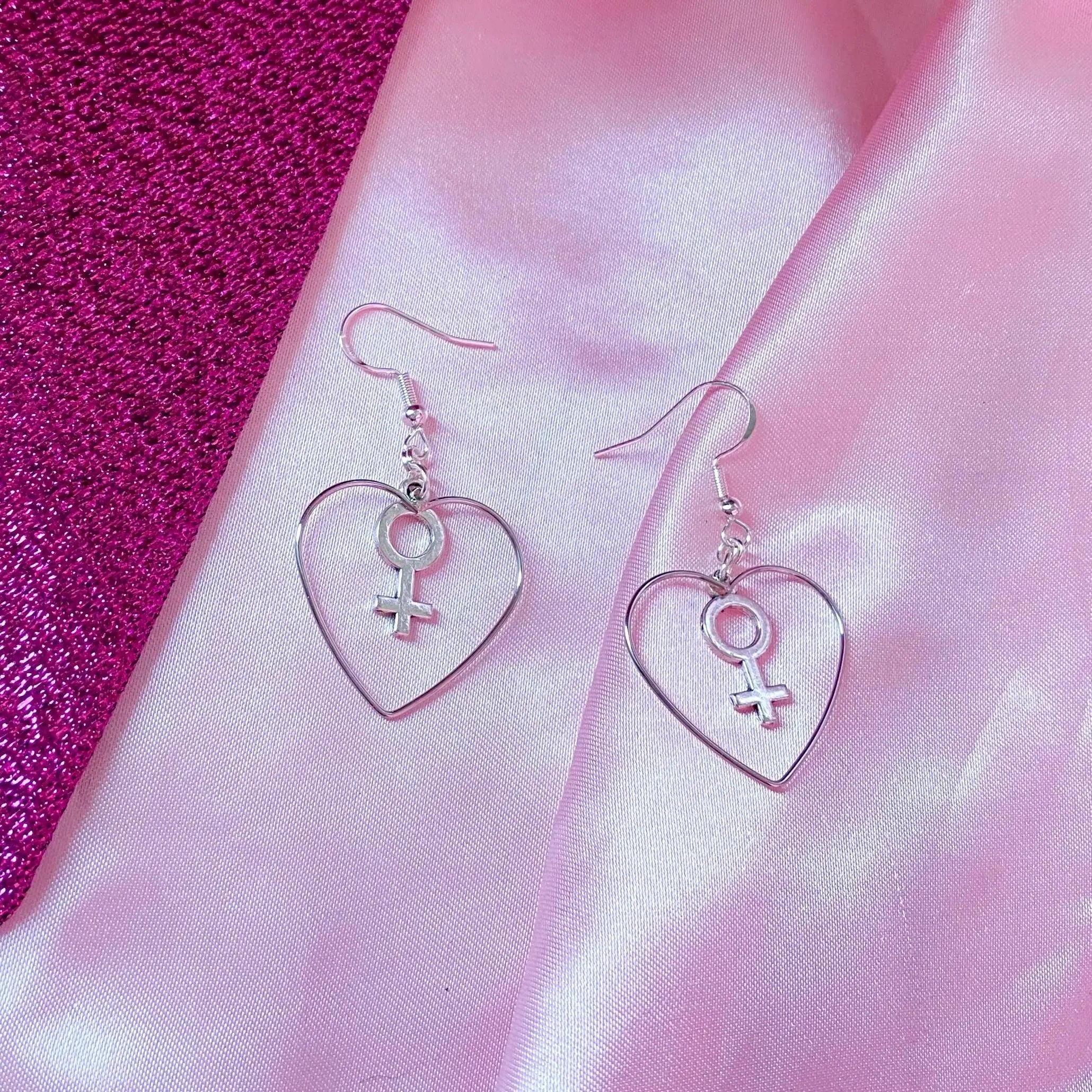 Silver colour heart and Venus charm earrings Leftbians