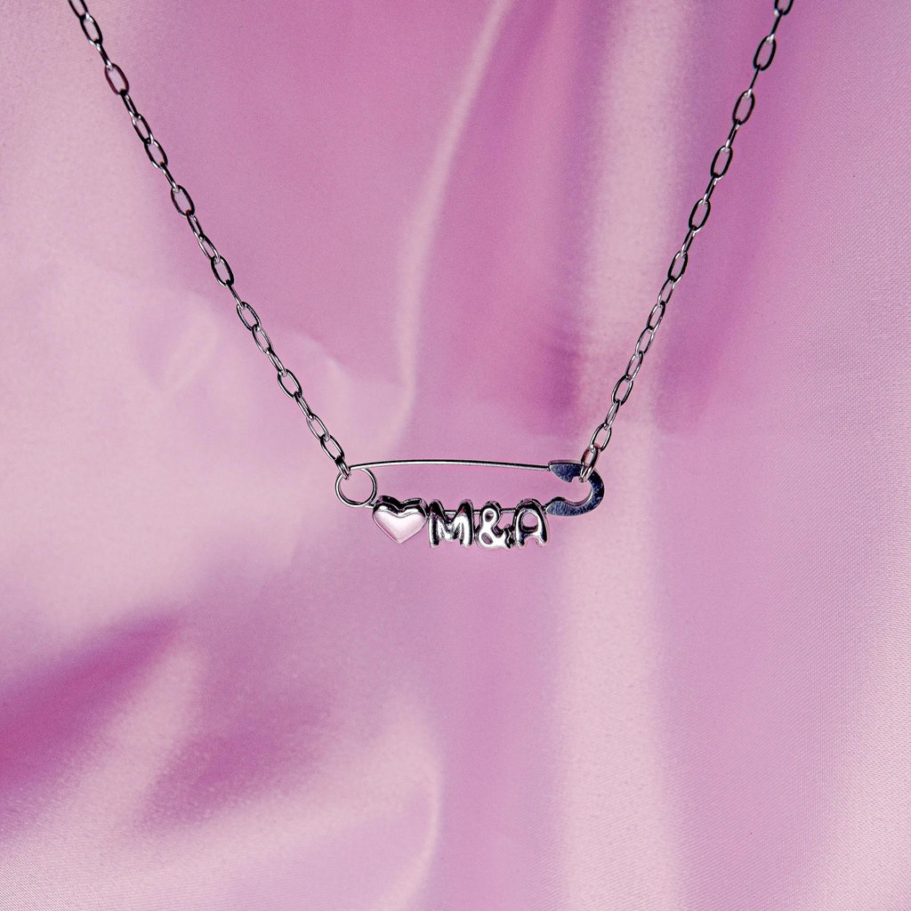 Silver safety pin couple heart necklace Leftbians