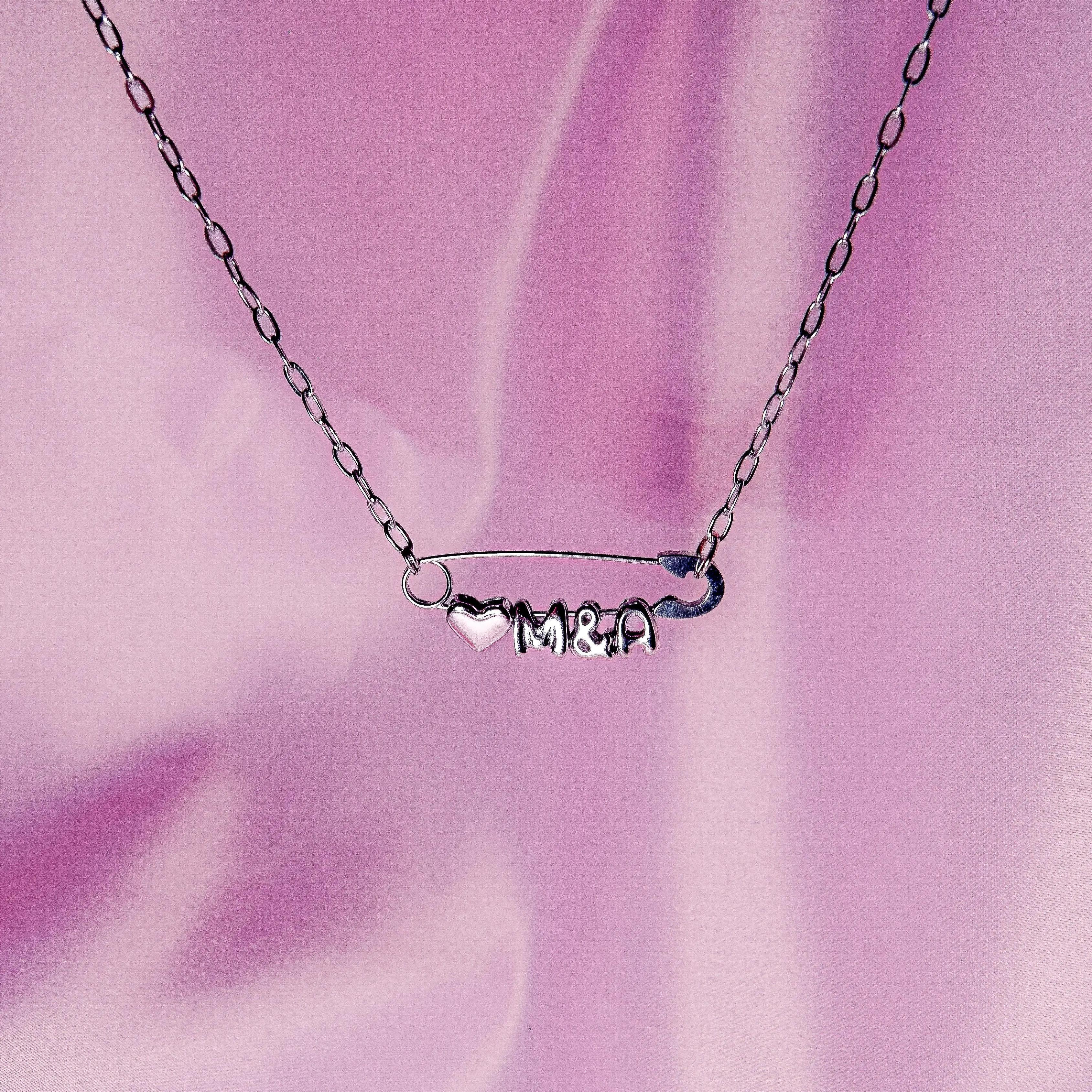 Silver safety pin couple heart necklace Leftbians