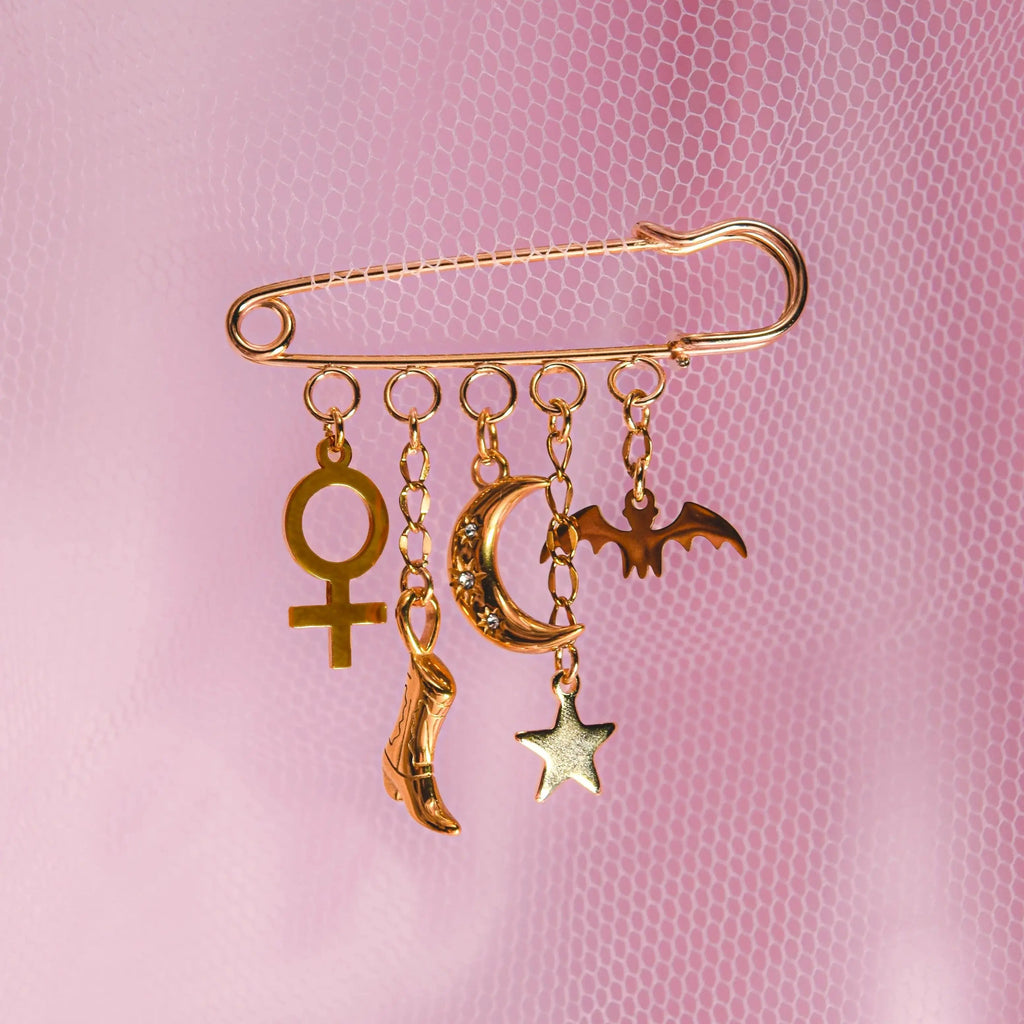 Gold custom charm brooch Leftbians