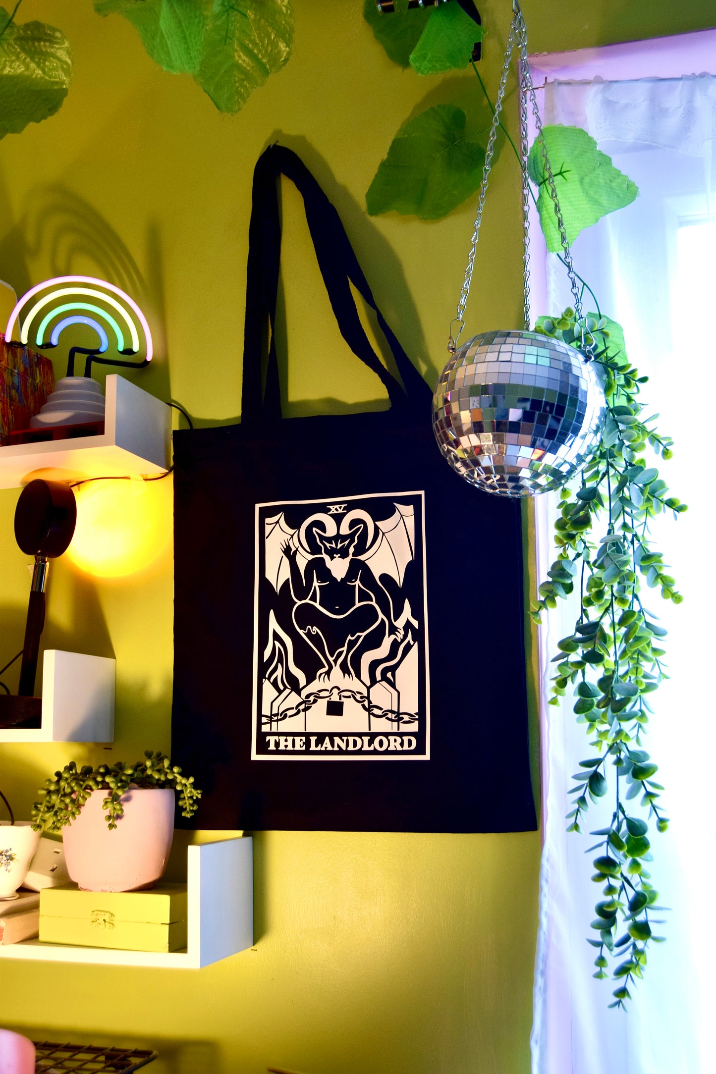 The Landlord tarot card black tote bag