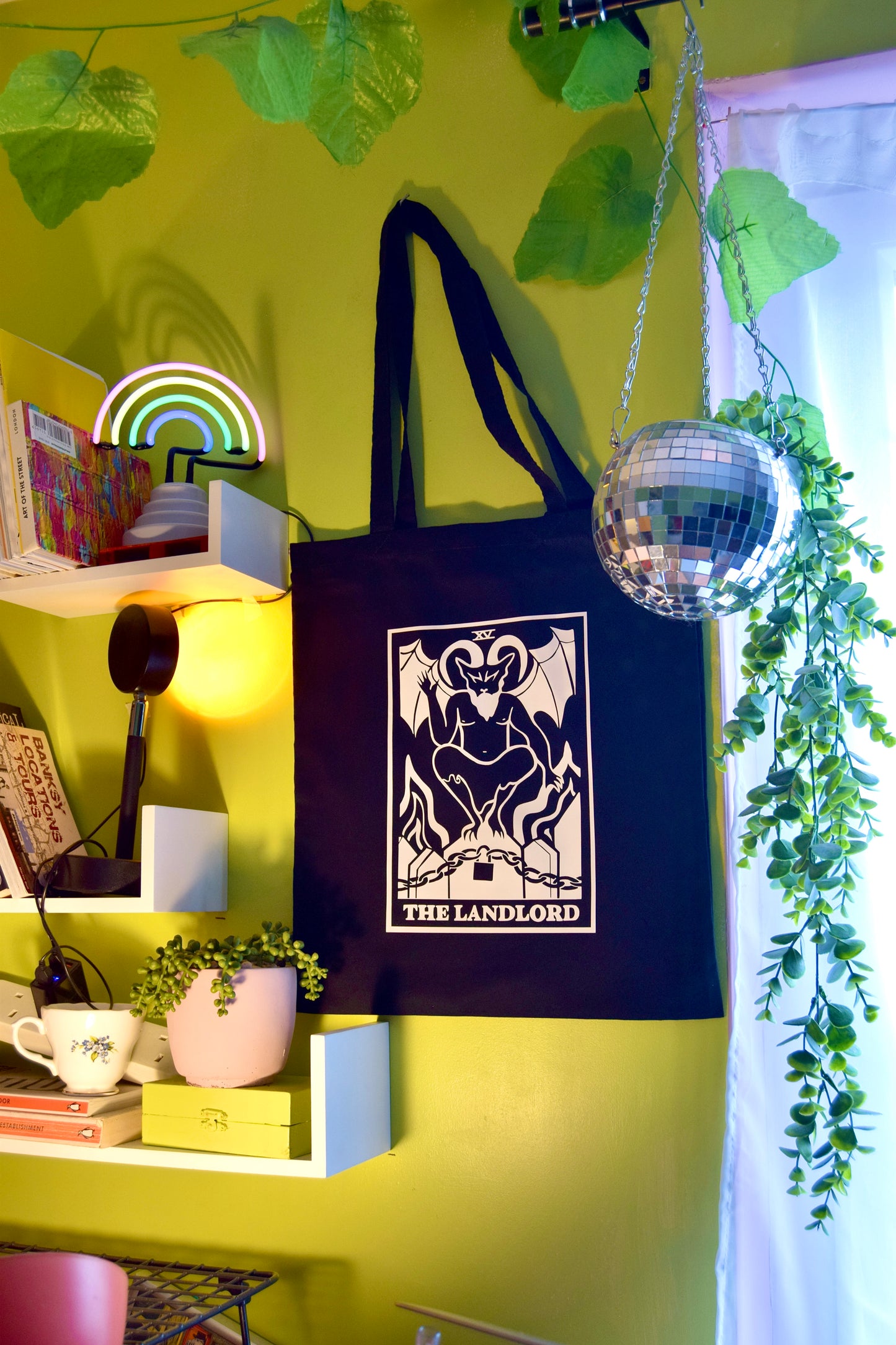 The Landlord tarot card black tote bag