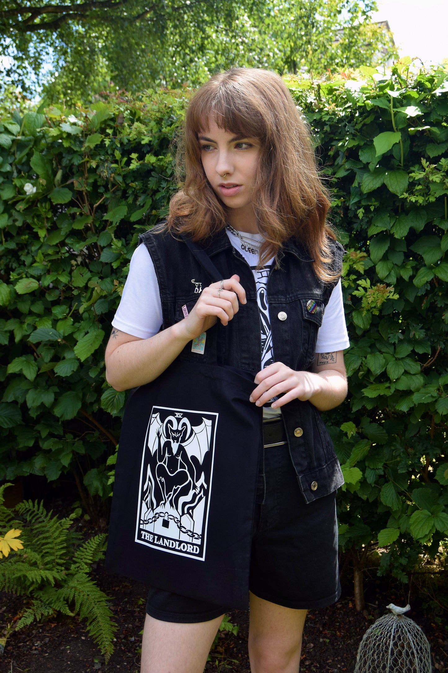 The Landlord tarot card black tote bag