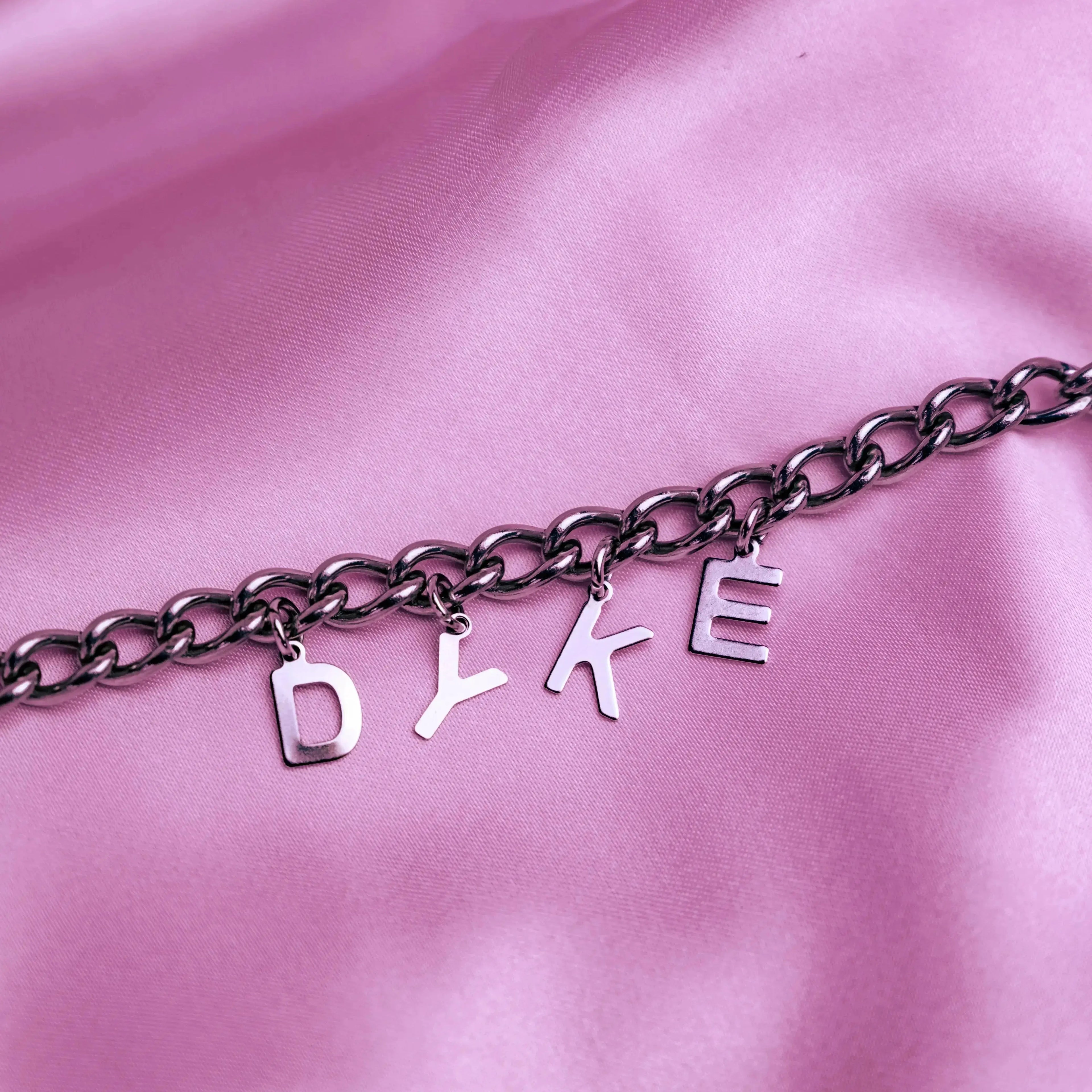 DYKE letter charm chain in stainless steel Leftbians