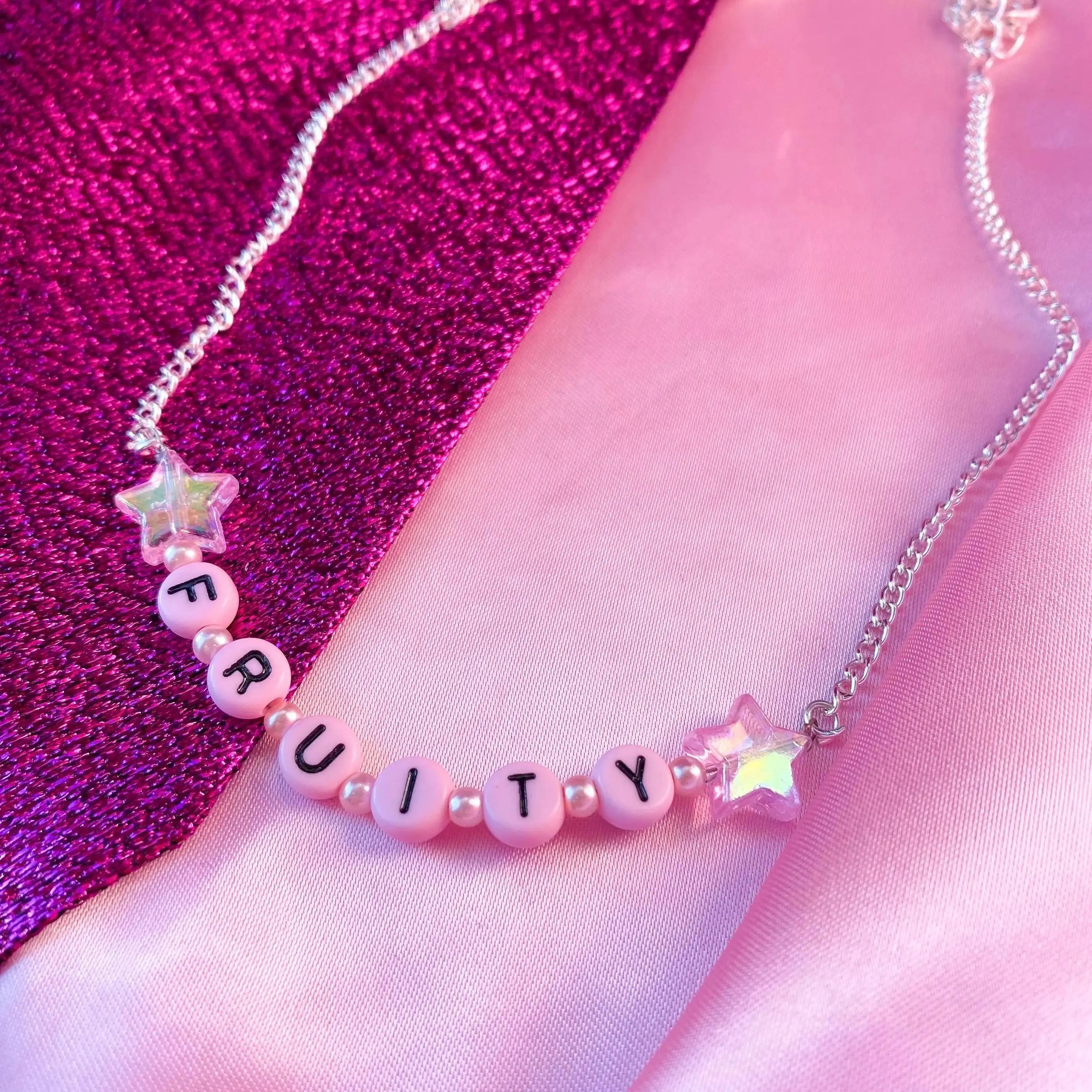 Pink FRUITY letter bead necklace Leftbians