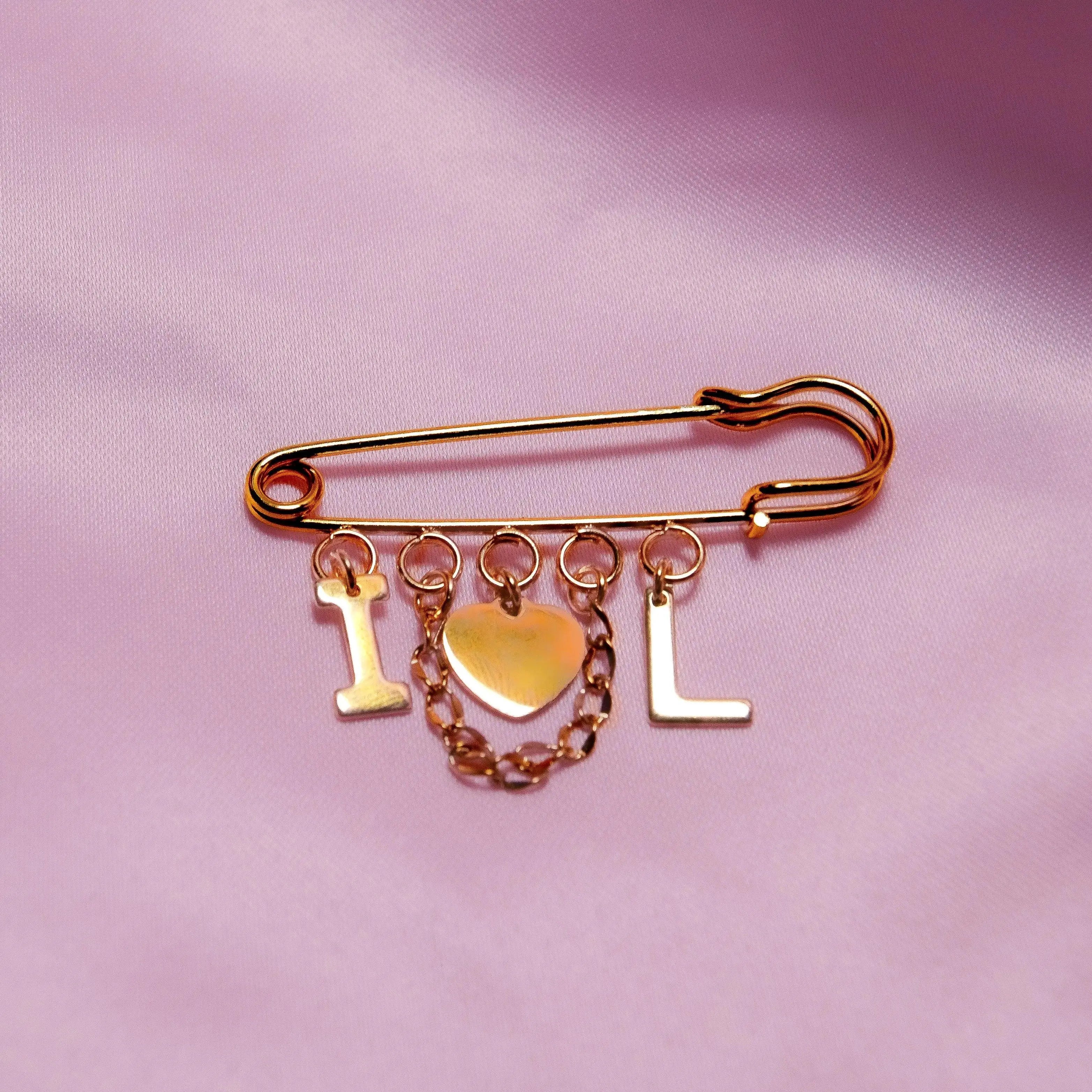 Gold custom couples brooch Leftbians