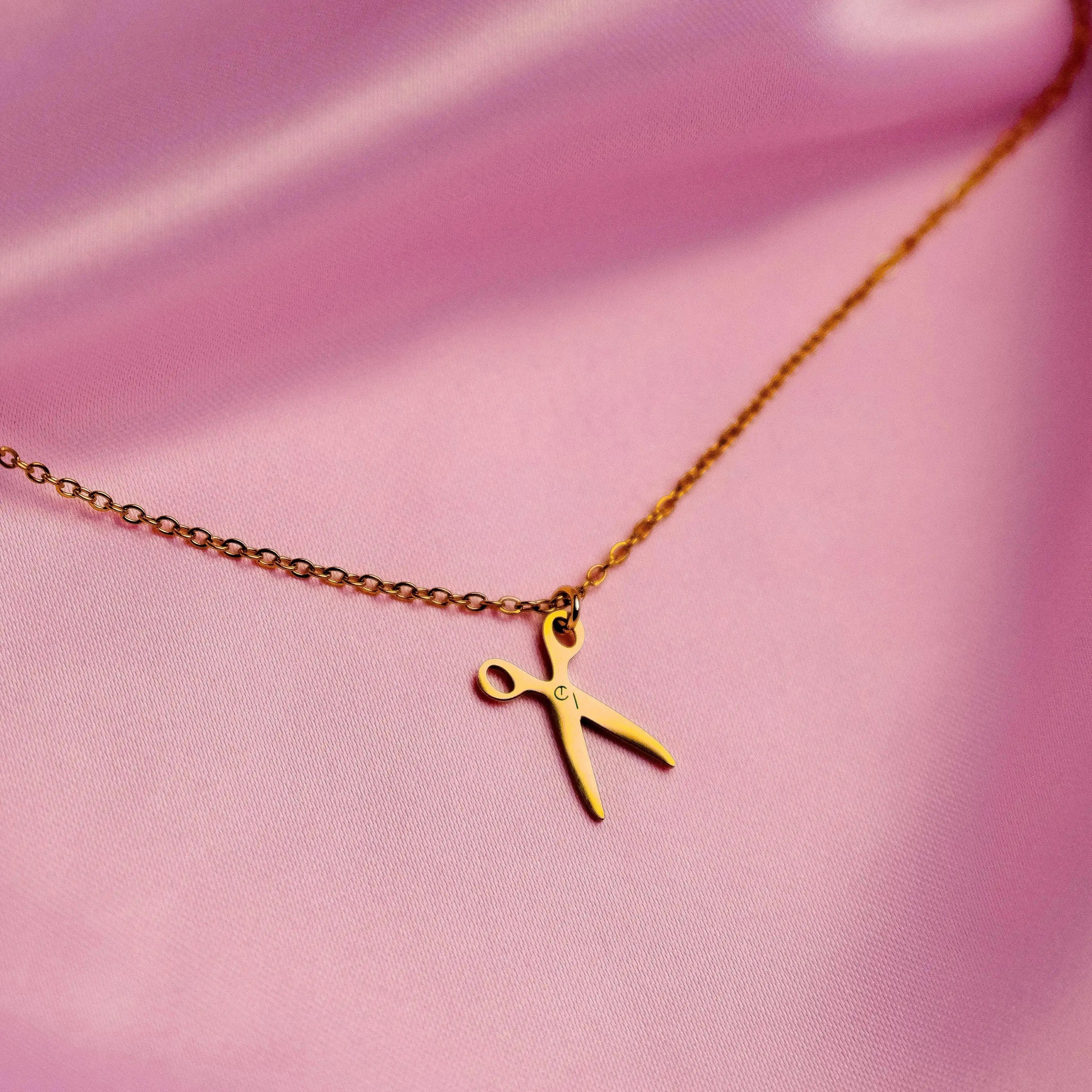 Gold single scissor charm necklace in stainless steel Leftbians