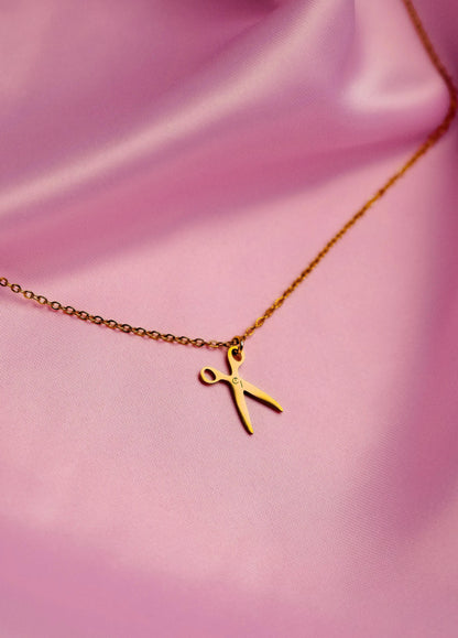 Gold single scissor charm necklace in stainless steel Leftbians