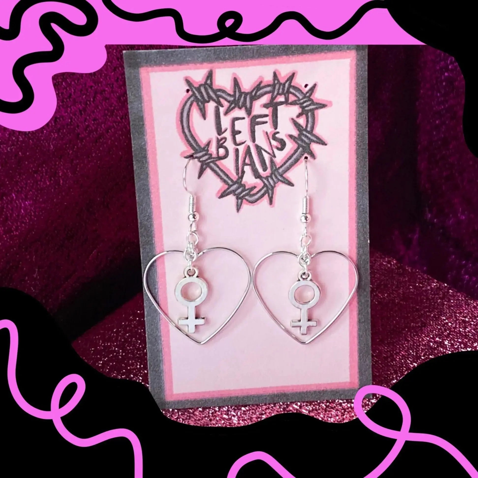 Silver colour heart and Venus charm earrings Leftbians