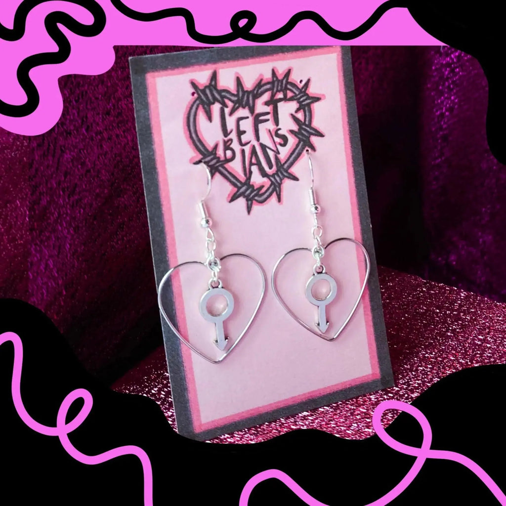 Silver colour heart and mars charm earrings Leftbians