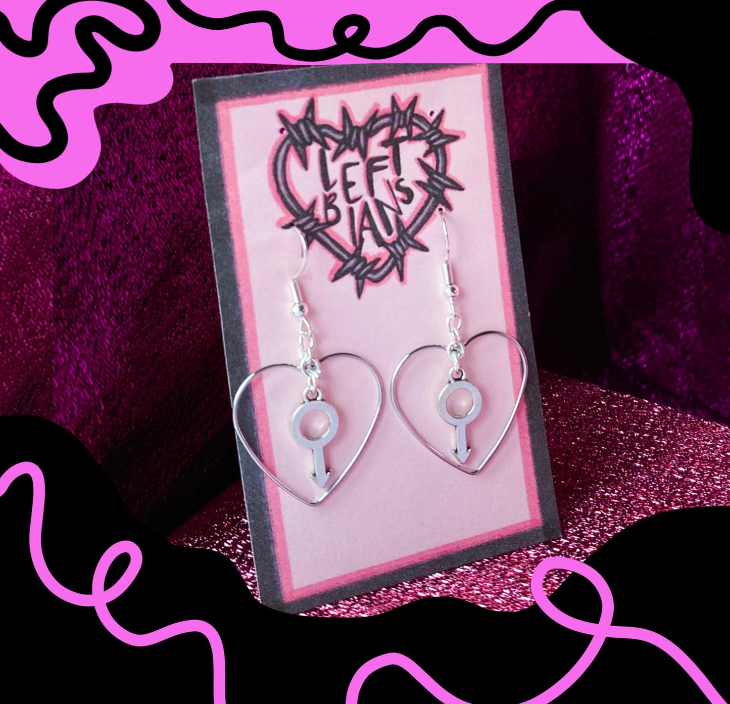 Silver colour heart and Mars charm earrings