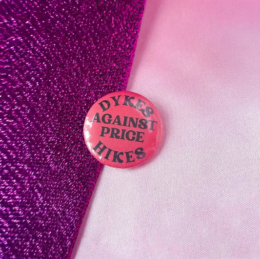 Dykes against price hikes badge Leftbians