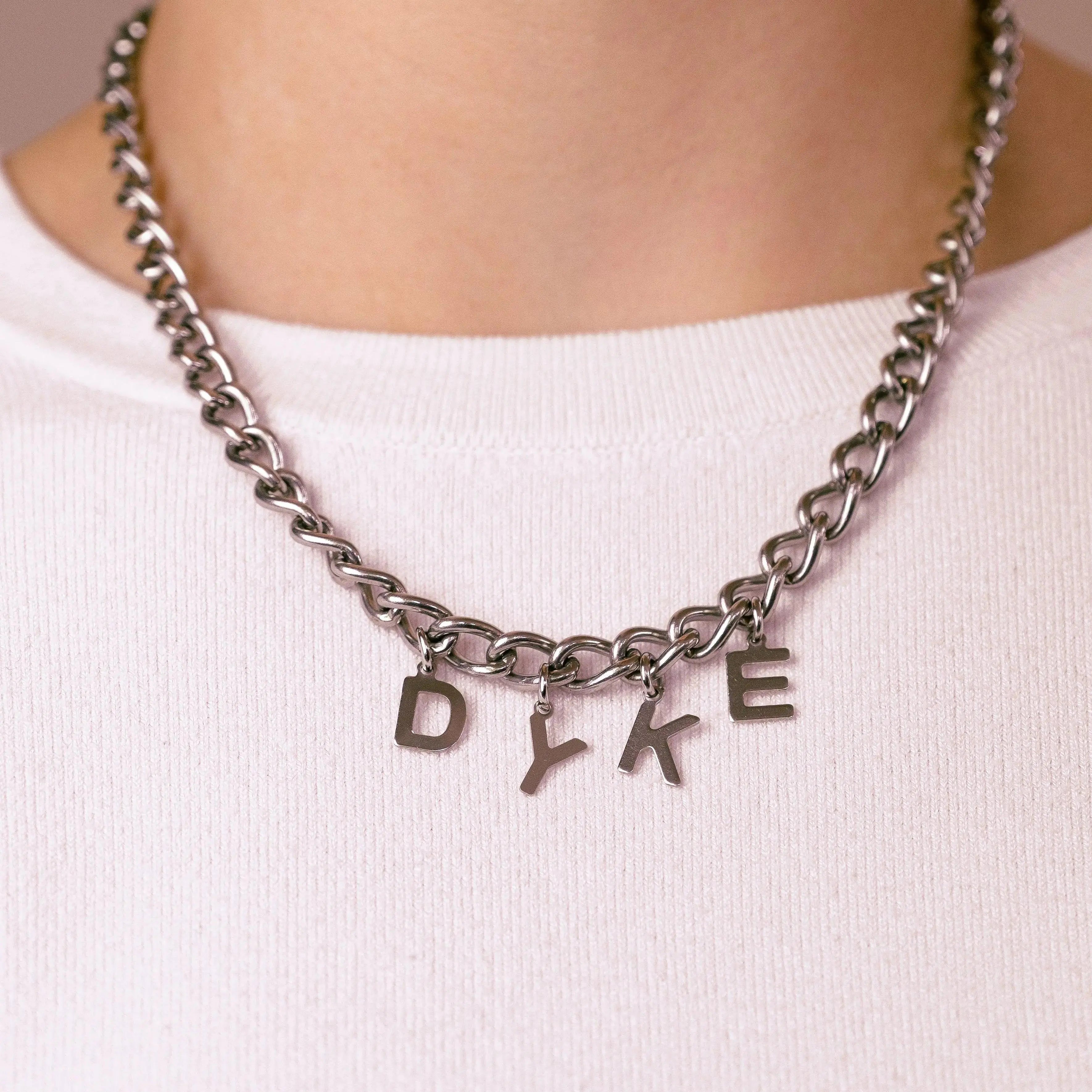 DYKE letter charm chain in stainless steel Leftbians