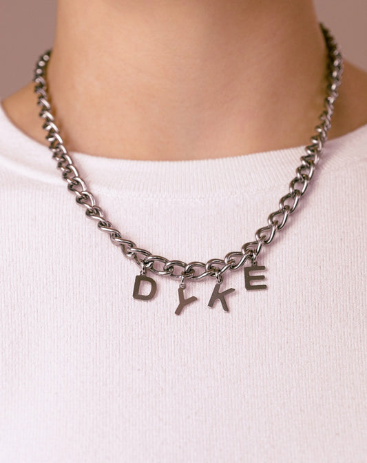 DYKE letter charm chain in stainless steel Leftbians