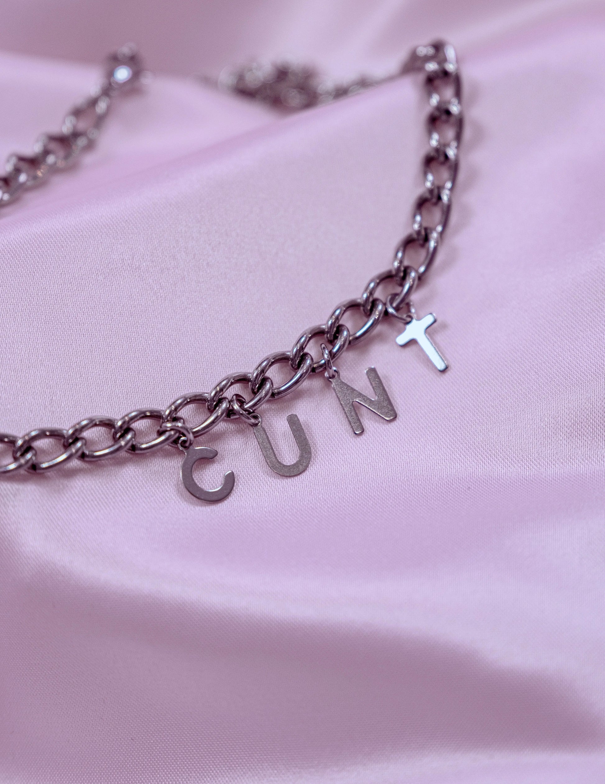 CUNT letter charm chain in stainless steel Leftbians