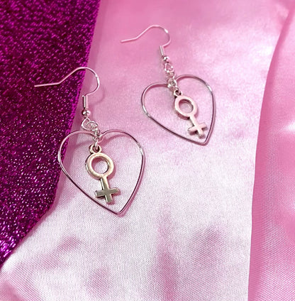 Silver colour heart and Venus charm earrings