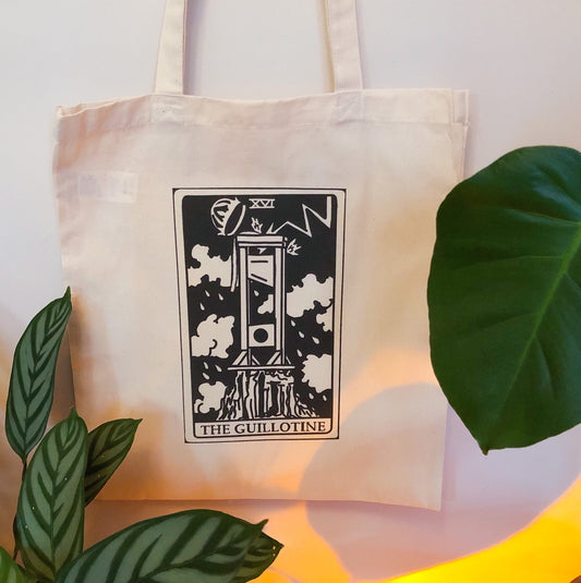 The Guillotine tarot card beige tote bag