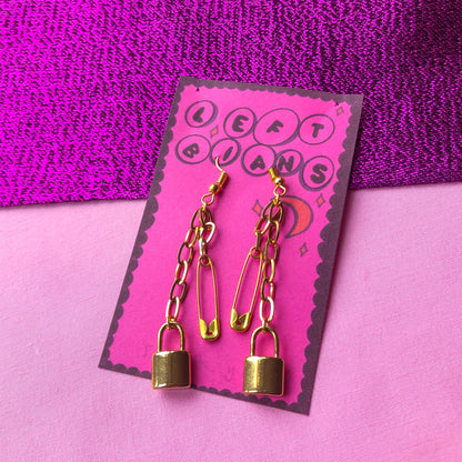 Gold locket and safety pin chain earrings