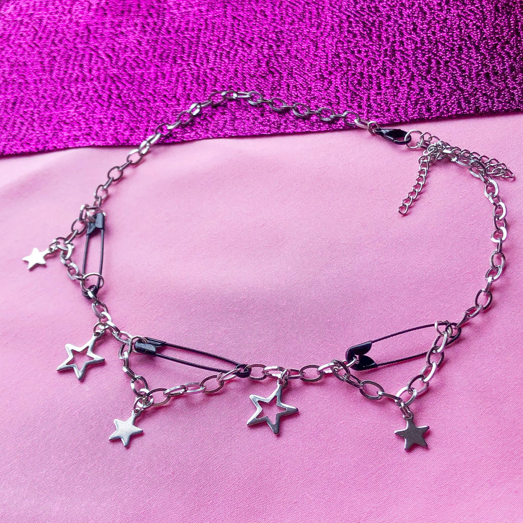 Black safety pin and star charm steel necklace Leftbians