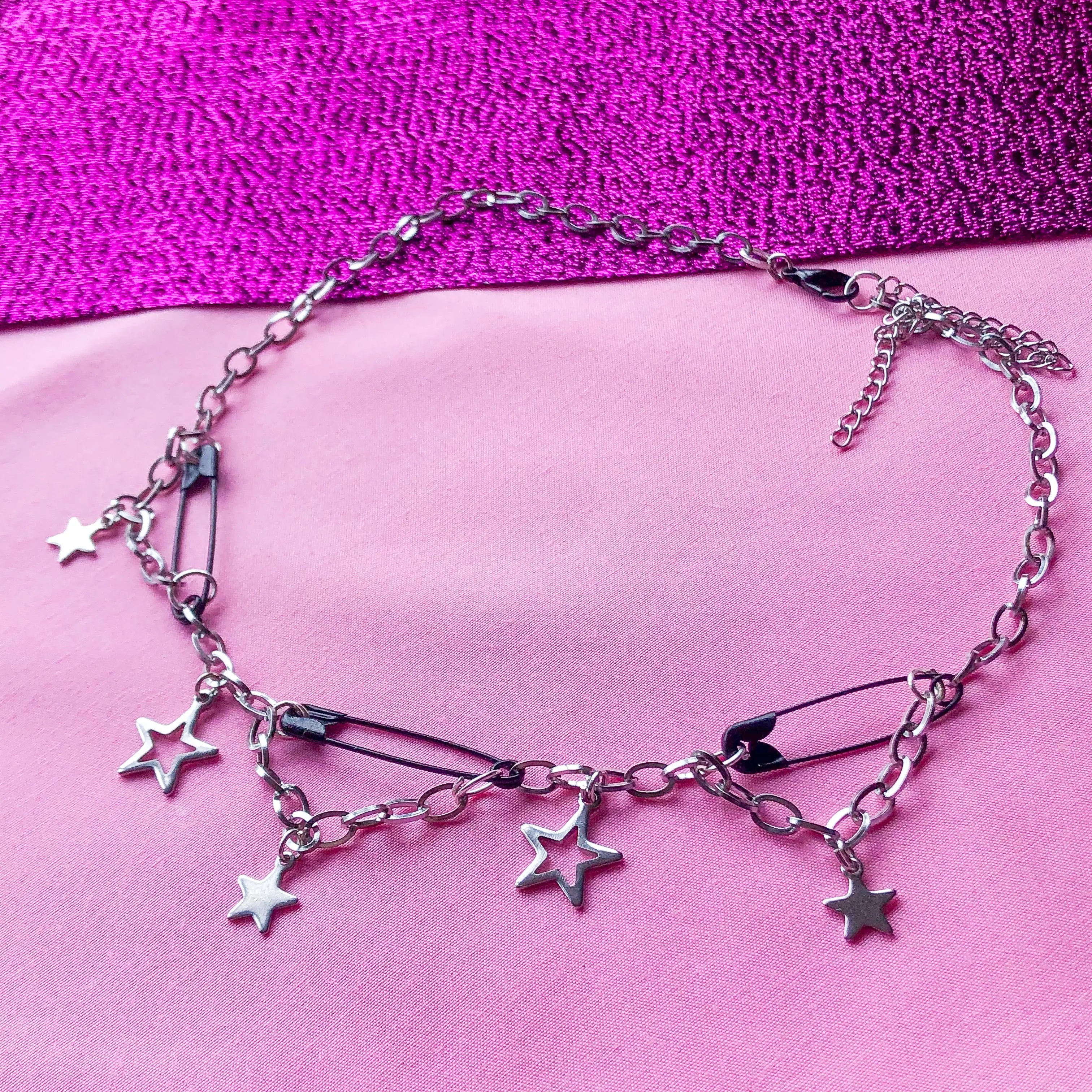 Black safety pin and star charm steel necklace Leftbians