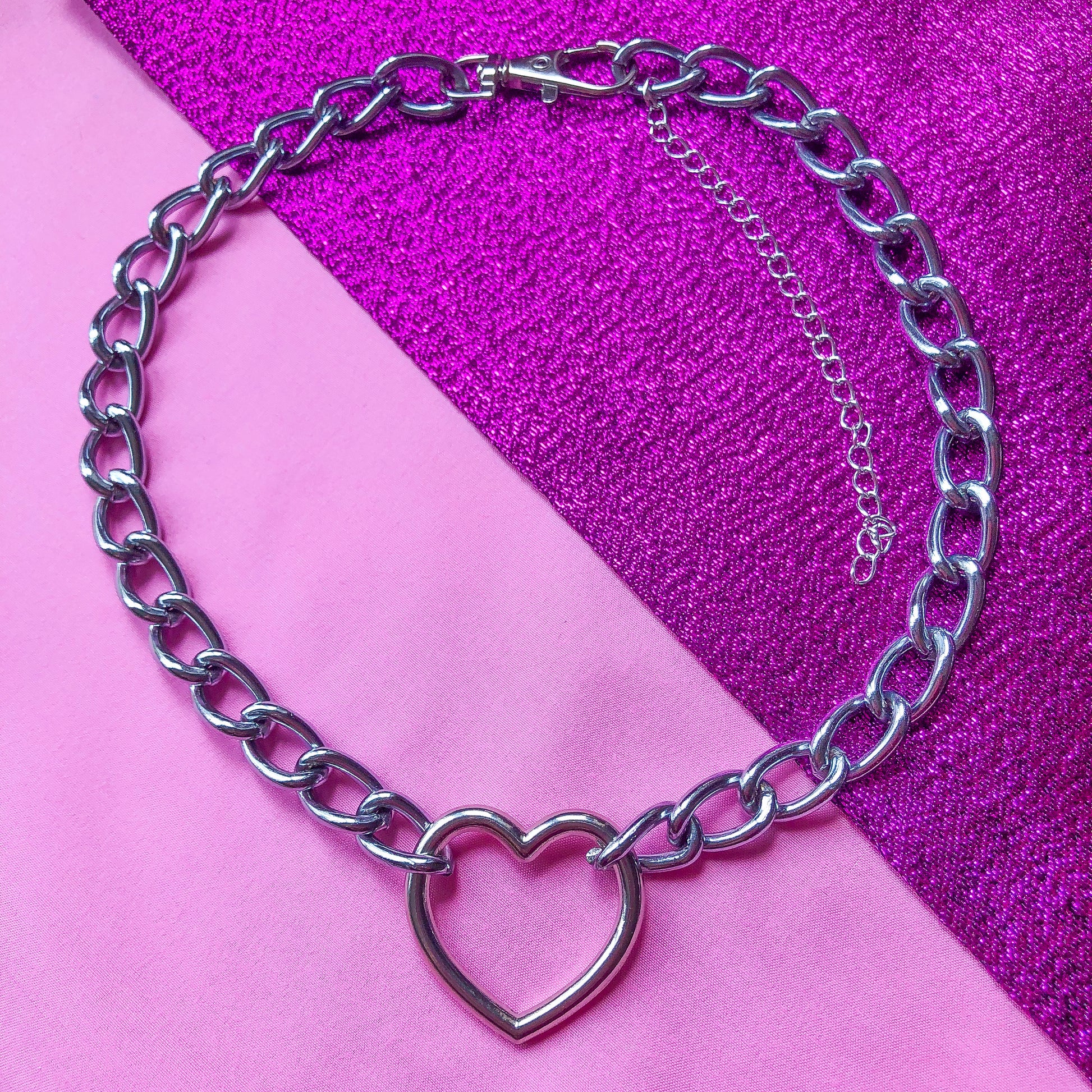 Chunky chain necklace with a love heart shaped O ring in the middle